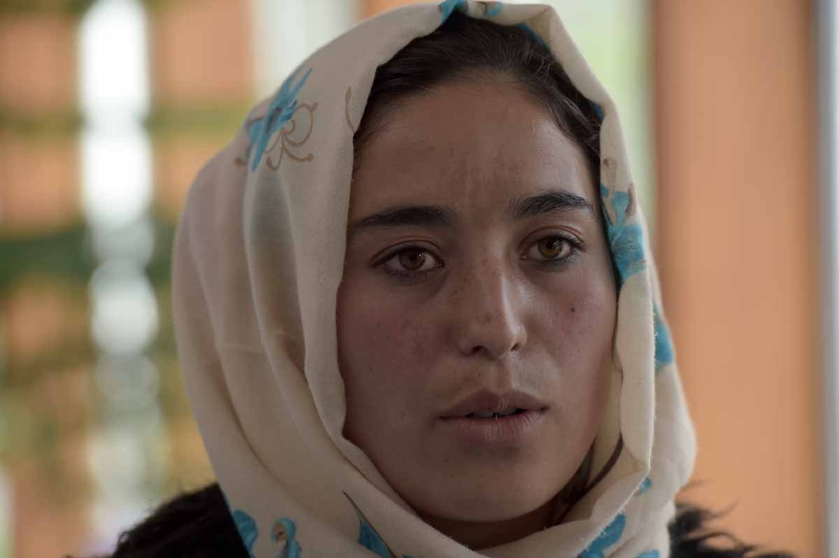 Eighteen year-old Masooma Hasani, who goes skiing in central Bamiyan province, speaks during a press conference at the Kabul university in Kabul on December 7, 2016.