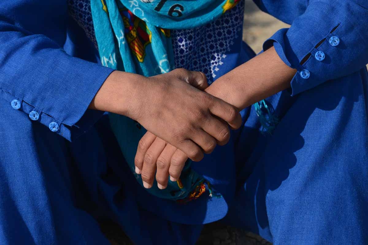 This file photo taken on October 31, 2016 shows an Afghan boy, who was held as a child sex slave, sitting at a restaurant in a unidentified location in Afghanistan.