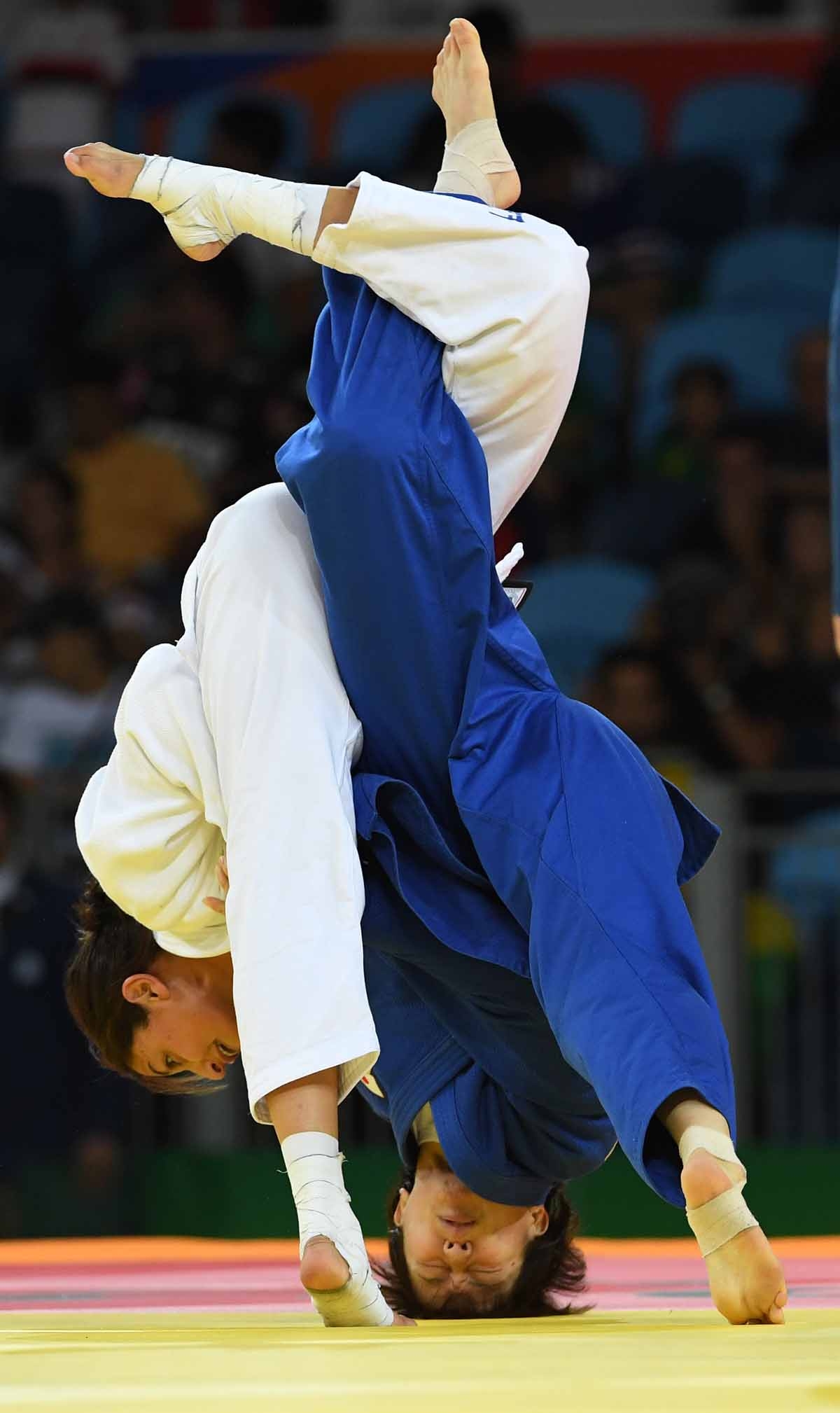 Israel's Yarden Gerbi (white) competes with Japan's Miku Tashiro during their women's -63kg judo contest bronze medal A match of the Rio 2016 Olympic Games in Rio de Janeiro on August 9, 2016. Israel's Yarden Gerbi (white) competes with Japan's Miku Tashiro during their women's -63kg judo contest bronze medal A match of the Rio 2016 Olympic Games in Rio de Janeiro on August 9, 2016.