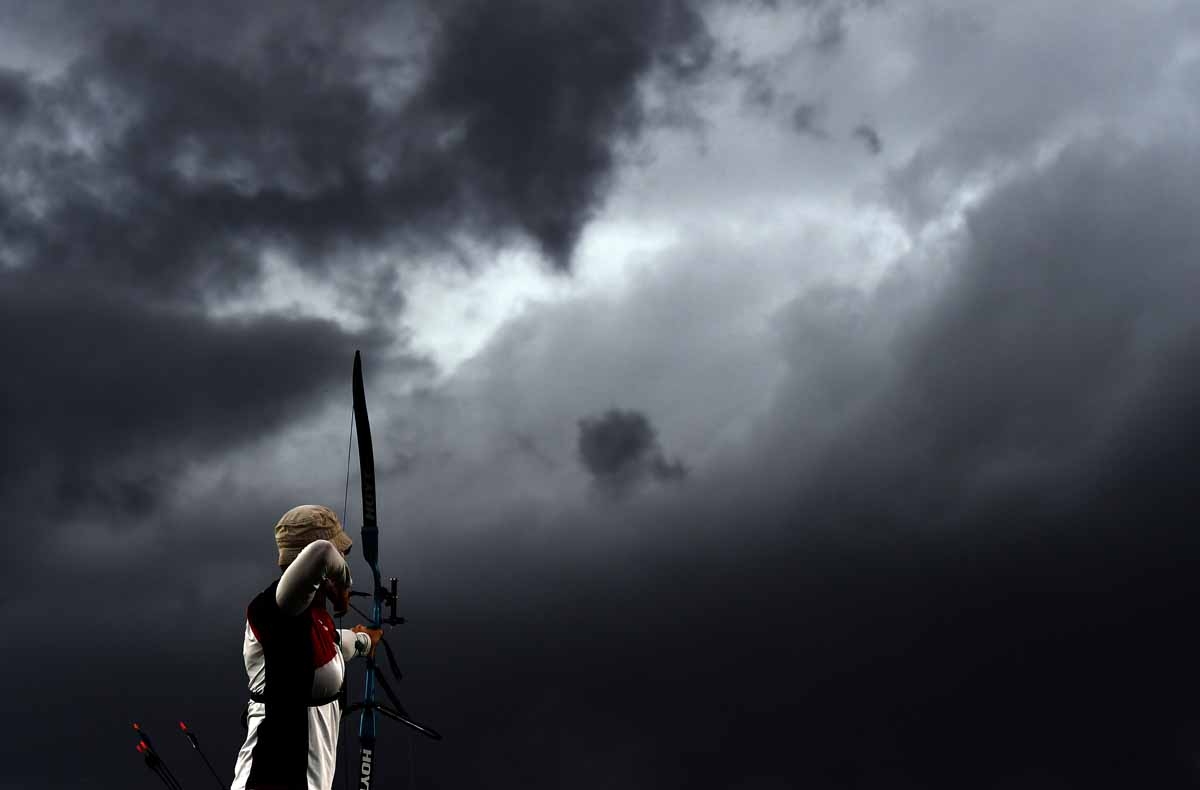 Germanys Lisa Unruh shoots an arrow during the Rio 2016 Olympic Games women's competition at the Sambodromo archery venue in Rio de Janeiro, Brazil, on August 10, 2016. Germanys Lisa Unruh shoots an arrow during the Rio 2016 Olympic Games women's competition at the Sambodromo archery venue in Rio de Janeiro, Brazil, on August 10, 2016.