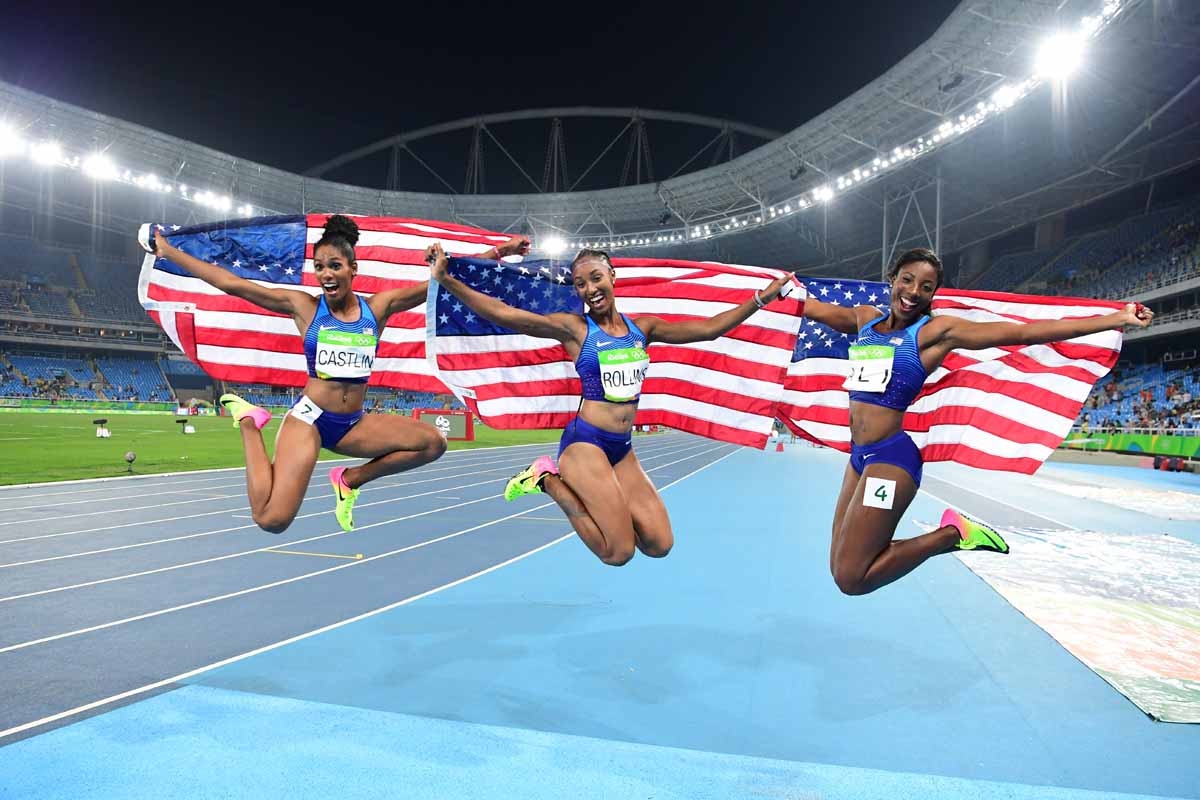 (L-R) Bronze medallist USA's Kristi Castlin, gold medallist USA's Brianna Rollins and silver medallist USA's Nia Ali celebrate after the Women's 100m Hurdles Final during the athletics event at the Rio 2016 Olympic Games at the Olympic Stadium in Rio de J (L-R) Bronze medallist USA's Kristi Castlin, gold medallist USA's Brianna Rollins and silver medallist USA's Nia Ali celebrate after the Women's 100m Hurdles Final during the athletics event at the Rio 2016 Olympic Games at the Olympic Stadium in Rio de J
