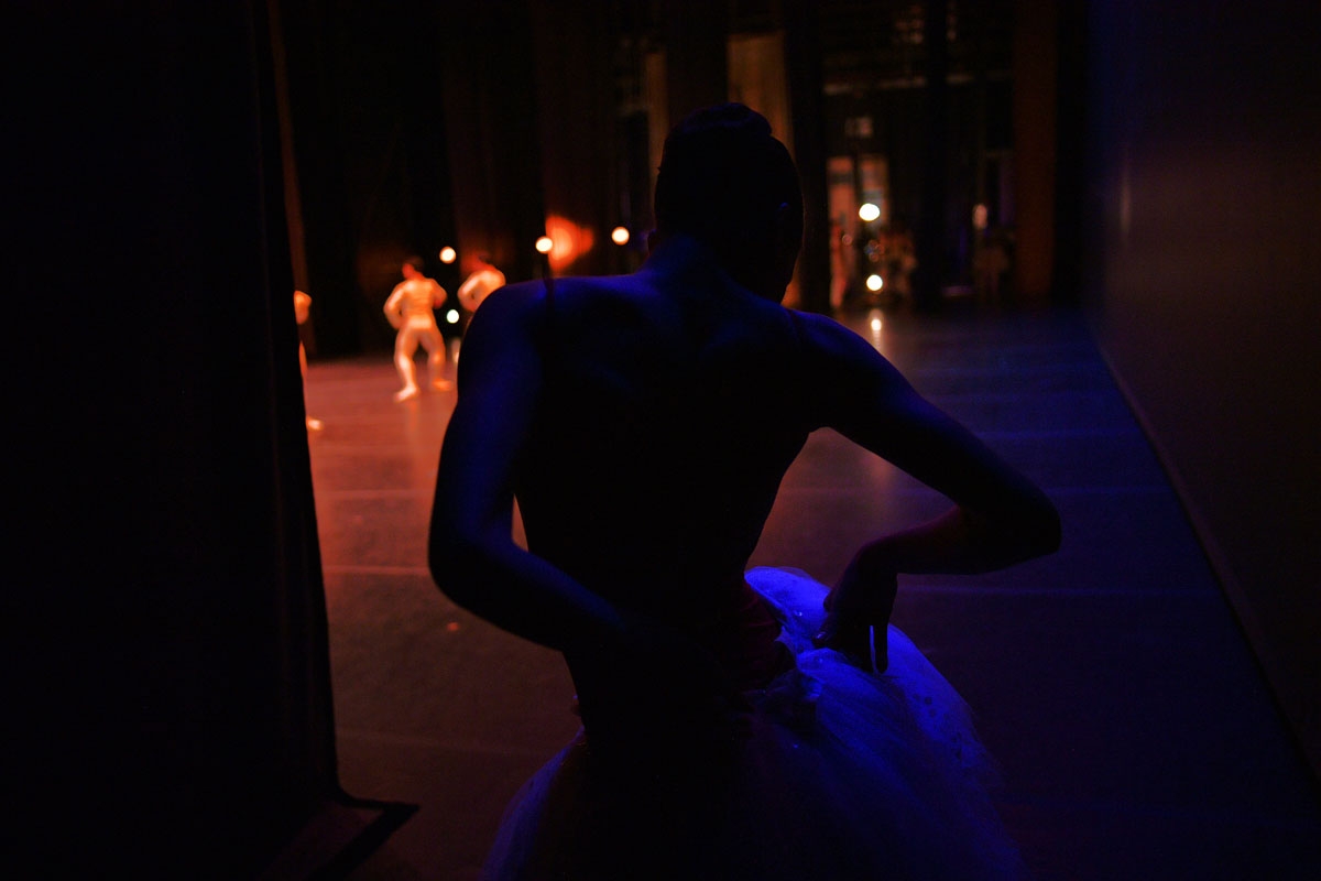 A Ballet dancer rehearses before the opening night of a Ballet production, at the Municipal Theater in Rio de Janeiro, Brazil on June 20, 2018.