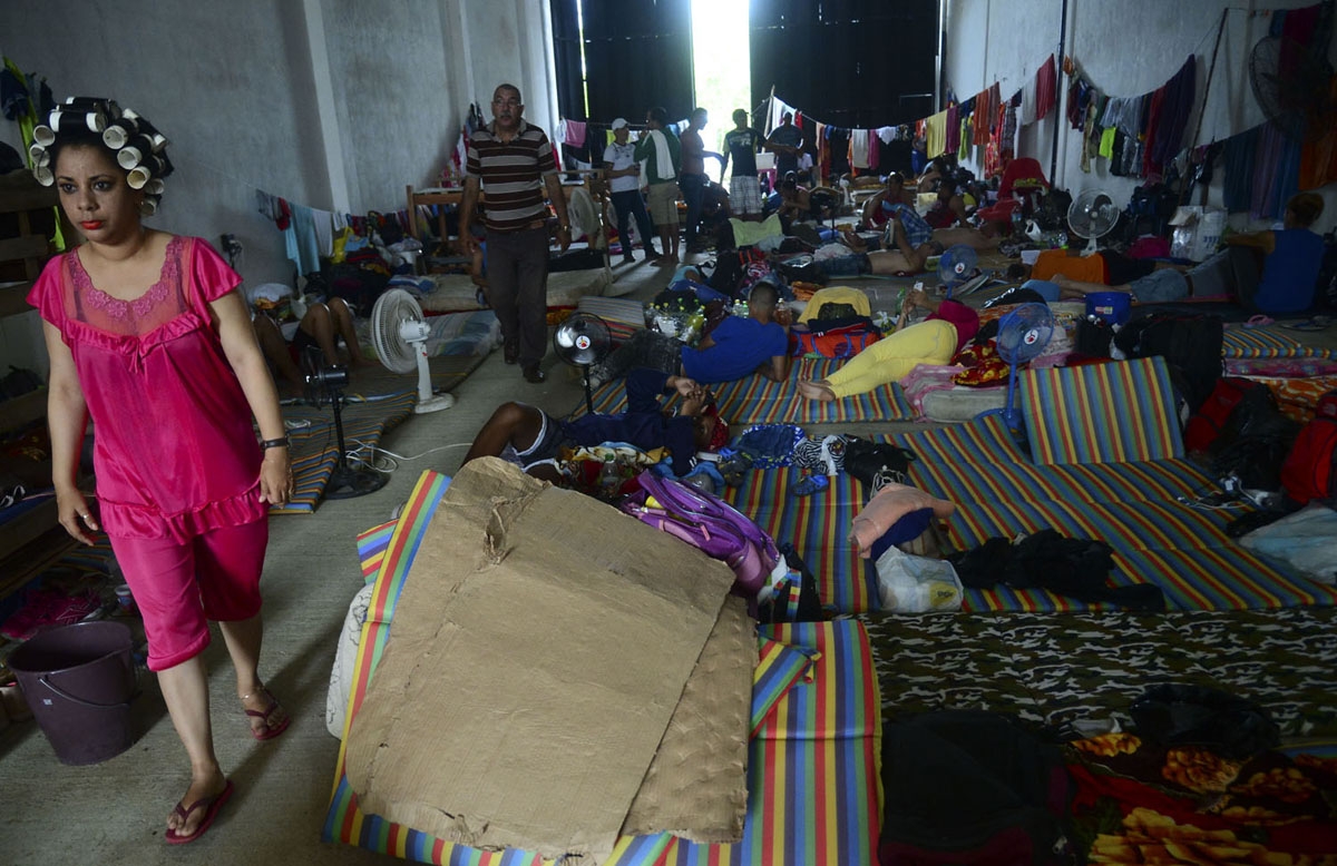 Cuban migrants rest in a shelter in the Turbo municipality, Antioquia department, Colombia, on June 14, 2016