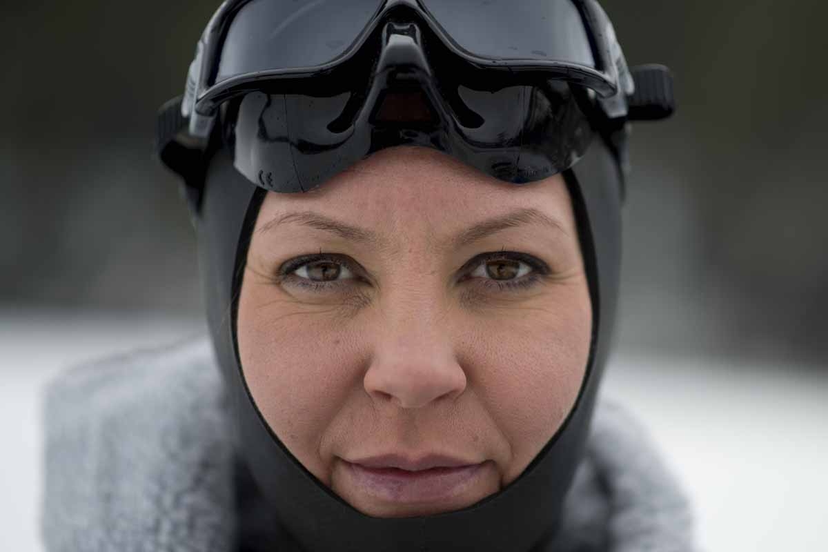 Johanna Nordblad, 42, Finnish freediver poses on a frozen lake before a Ice-freediving training session on February 28, 2017, in Somero (southwest Finland).