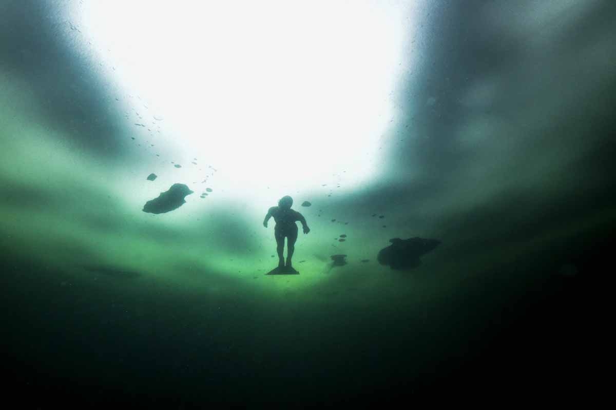 Johanna Nordblad, 42, Finnish freediver swims under ice during a Ice-freediving training session on February 28, 2017, in a green lake in Somero (southwest Finland).