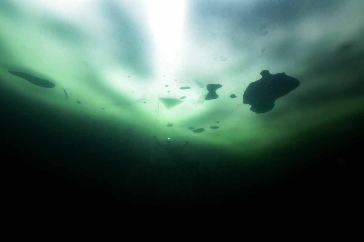 Johanna Nordblad, 42, Finnish freediver swims under ice during a Ice-freediving training session on February 28, 2017, in Somero (southwest Finland).
