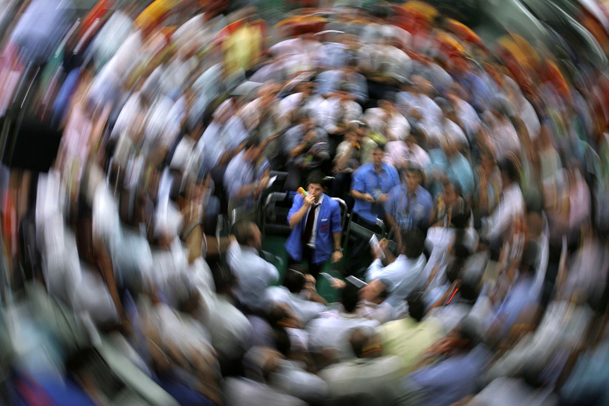 Stock traders negotiate in the iBovespa future index pit during the morning session, at the Mercantile & Futures Exchange (BM&F), in Sao Paulo, Brazil, on October 23, 2008. Stock traders negotiate in the iBovespa future index pit during the morning session, at the Mercantile & Futures Exchange (BM&F), in Sao Paulo, Brazil, on October 23, 2008.