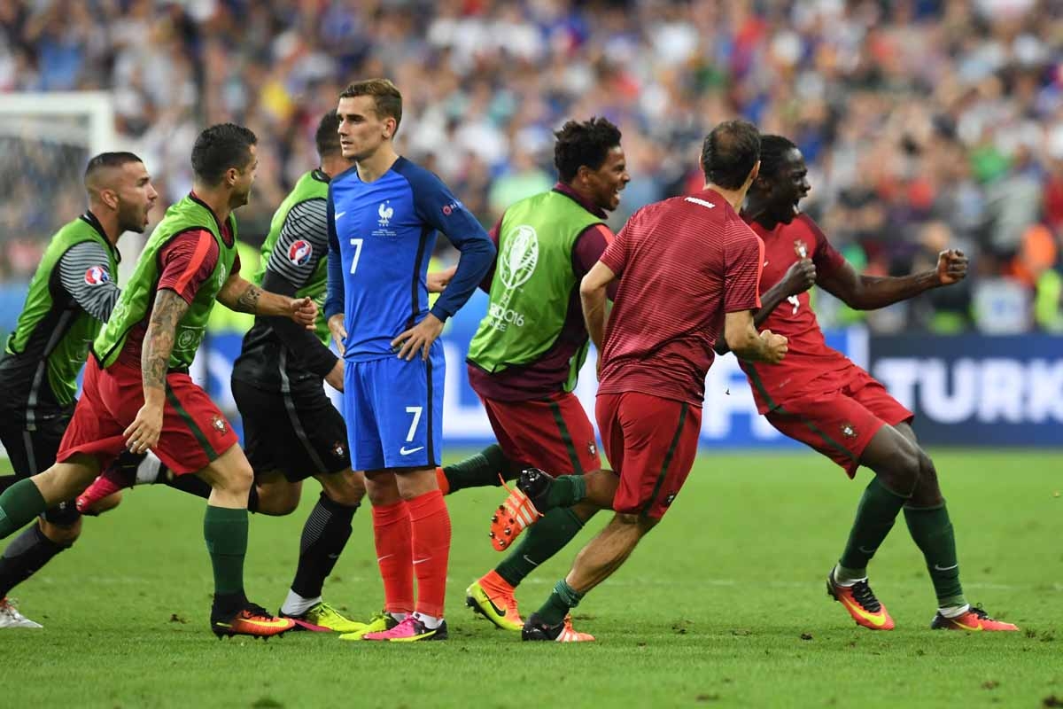 Portugal's forward Eder (R) celebrates with teammates past France's forward Antoine Griezmann (C) after he scored during the Euro 2016 final football match between Portugal and France at the Stade de France in Saint-Denis, north of Paris, on July 10, 2016 Portugal's forward Eder (R) celebrates with teammates past France's forward Antoine Griezmann (C) after he scored during the Euro 2016 final football match between Portugal and France at the Stade de France in Saint-Denis, north of Paris, on July 10, 2016