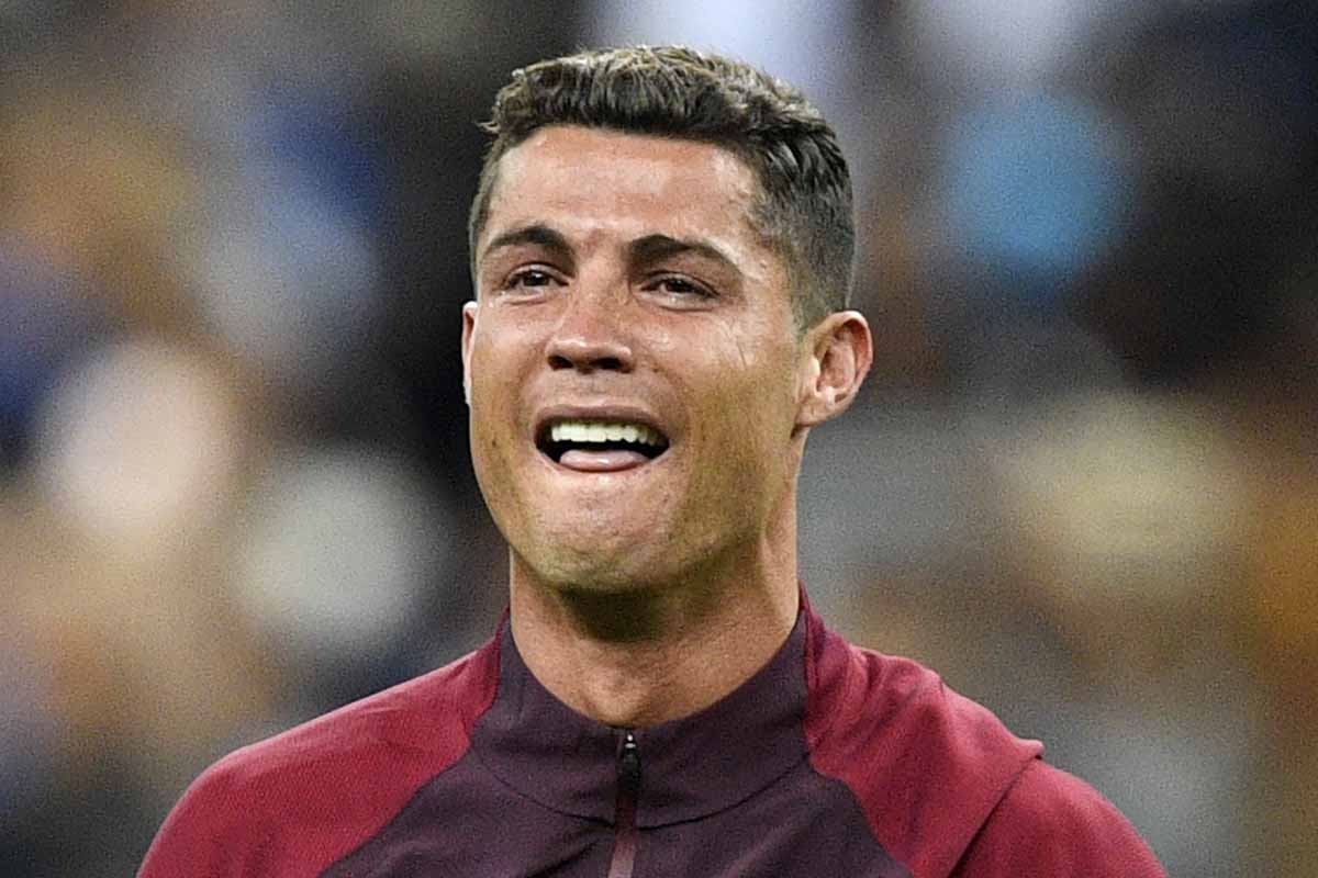Portugal's forward Cristiano Ronaldo reacts as Portugal beats France 1-0 to clinch the Euro 2016 final football match between France and Portugal at the Stade de France in Saint-Denis, north of Paris, on July 10, 2016. / AFP PHOTO / MARTIN BUREAU Portugal's forward Cristiano Ronaldo reacts as Portugal beats France 1-0 to clinch the Euro 2016 final football match between France and Portugal at the Stade de France in Saint-Denis, north of Paris, on July 10, 2016. / AFP PHOTO / MARTIN BUREAU