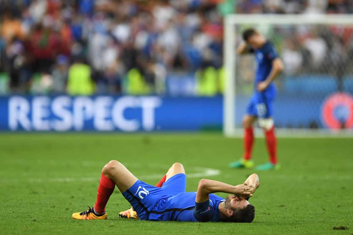France's forward Andre-Pierre Gignac reacts after Portugal won the Euro 2016 final football match between Portugal and France at the Stade de France in Saint-Denis, north of Paris, on July 10, 2016. / AFP PHOTO / PATRIK STOLLARZ France's forward Andre-Pierre Gignac reacts after Portugal won the Euro 2016 final football match between Portugal and France at the Stade de France in Saint-Denis, north of Paris, on July 10, 2016. / AFP PHOTO / PATRIK STOLLARZ