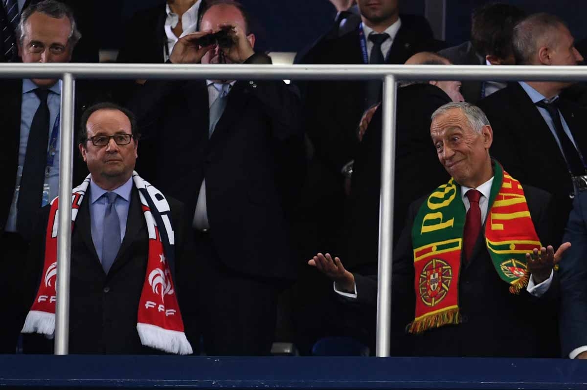 French President Francois Hollande (L) looks dejected next to his Portuguese counterpart Marcelo Rebelo de Sousa after Portugal won the Euro 2016 final football match between Portugal and France at the Stade de France in Saint-Denis, north of Paris, on Ju French President Francois Hollande (L) looks dejected next to his Portuguese counterpart Marcelo Rebelo de Sousa after Portugal won the Euro 2016 final football match between Portugal and France at the Stade de France in Saint-Denis, north of Paris, on Ju