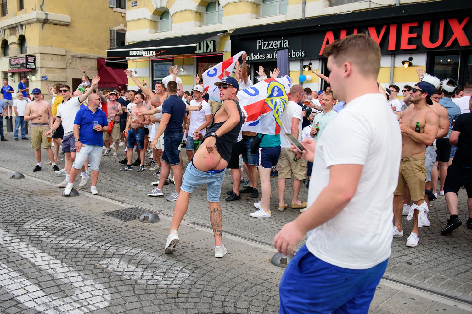England fans taunt French fans in Marseille, southern France, on June 10, 2016, ahead of England's Euro 2016 football match against Russia on June 11, 2016