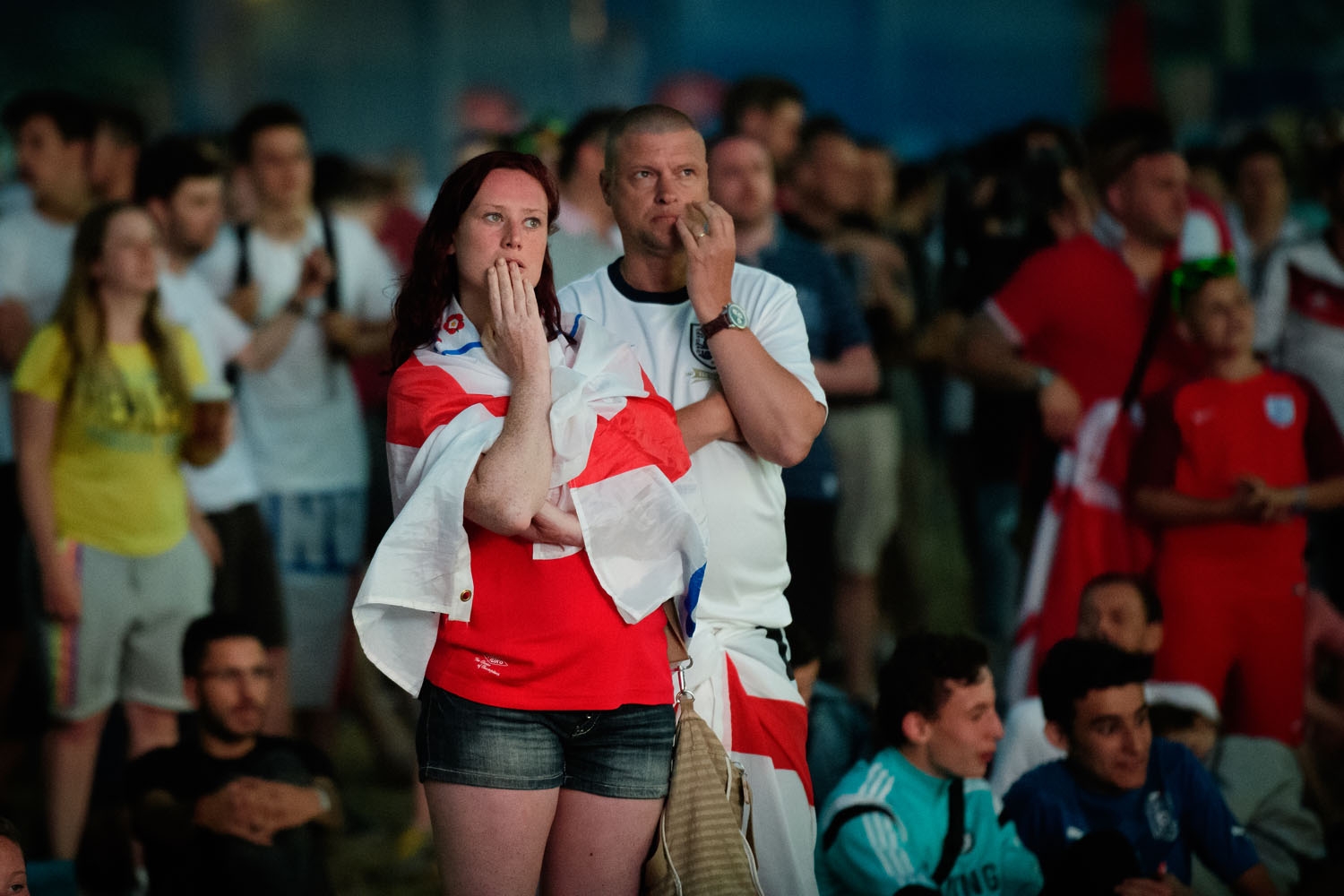 England supporters react as they watch the Euro 2016 group B football match between England and Russia from the fanzone in Marseille, on June 11, 2016