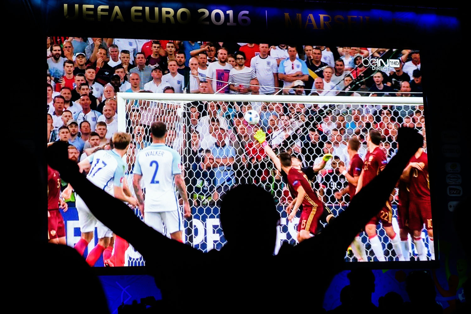 An England fan celebrates in the fanzone in Marseille after England's midfielder Eric Dier scored during the Euro 2016 group B football match between England and Russia, on June 11, 2016