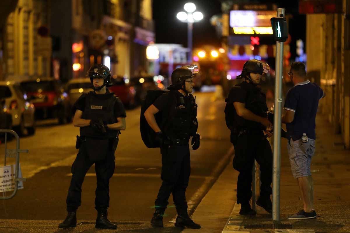 Police officers patrol and carry out checks in the centre of French Riviera town of Nice, after a van drove into a crowd watching a fireworks display on July 14, 2016. Police officers patrol and carry out checks in the centre of French Riviera town of Nice, after a van drove into a crowd watching a fireworks display on July 14, 2016.