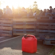 Prison wardens stand behing a barricade during a protest oustide the Fleury-Merogis prison called by several unions following an attack against six prison wardens, in Fleury-Merogis on April 10, 2017.