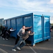 Demonstrators move a container to block the access to the Fleury-Merogis prison in Fleury-Merogis on April 10, 2017, during a protest called by several unions following an attack against six prison wardens.