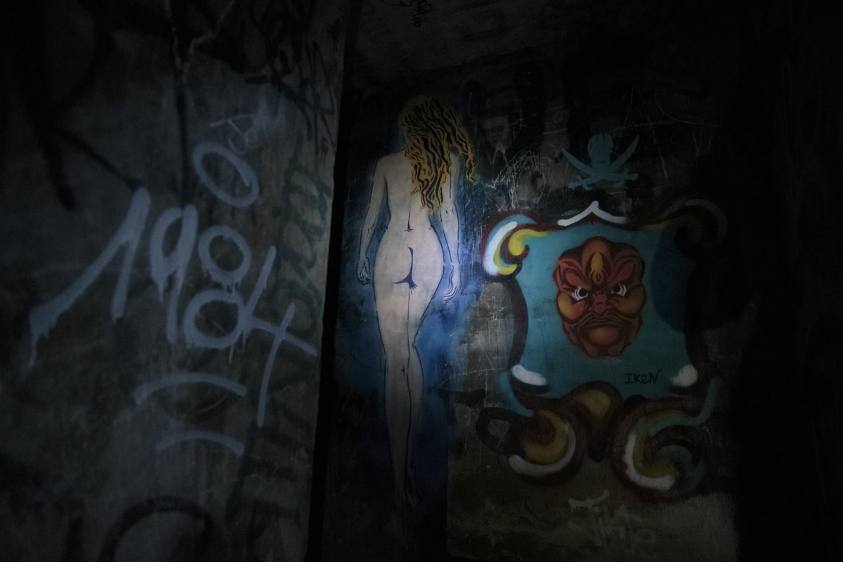 This photograph taken on October 31, 2017, shows a painted wall in the banned catacombs of Paris.