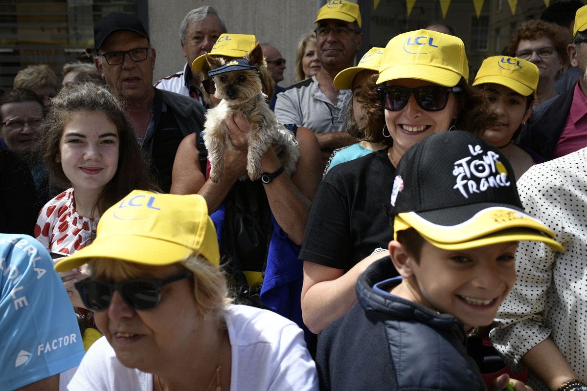 Supporters wait for riders near the finish line during the 212,5 km third stage of the 104th edition of the Tour de France cycling race on July 3, 2017 between Verviers, Belgium and Longwy, France.