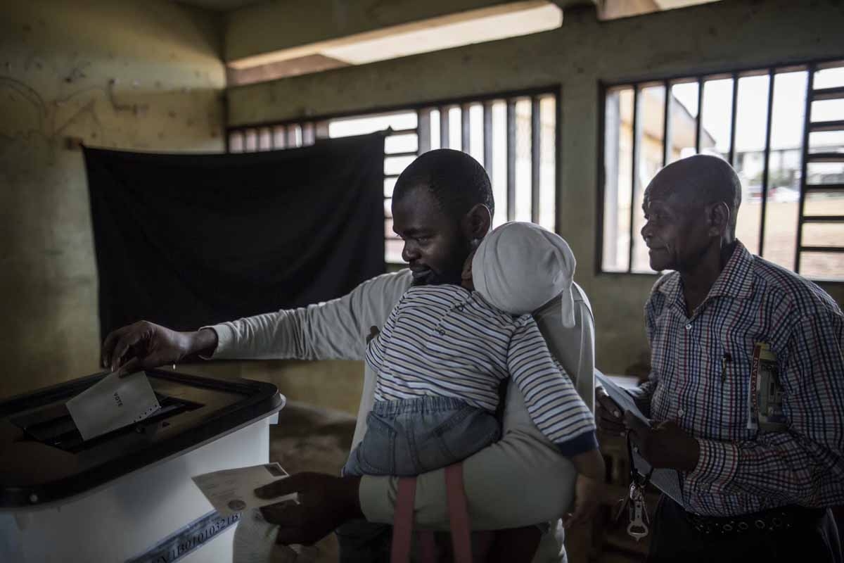 Gabonese voters queue to cast their ballots during the Presidential Election on August 27, 2016 in Libreville. Gabonese voters queue to cast their ballots during the Presidential Election on August 27, 2016 in Libreville.