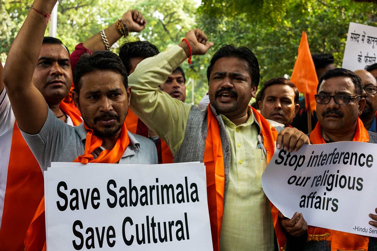 In this file photo taken on October 4, 2018 members of Indian right wing group Hindu Sena shout slogans as they protest against the Supreme Court decision to allow women of all ages to enter Kerala's Sabarimala temple, in New Delhi.