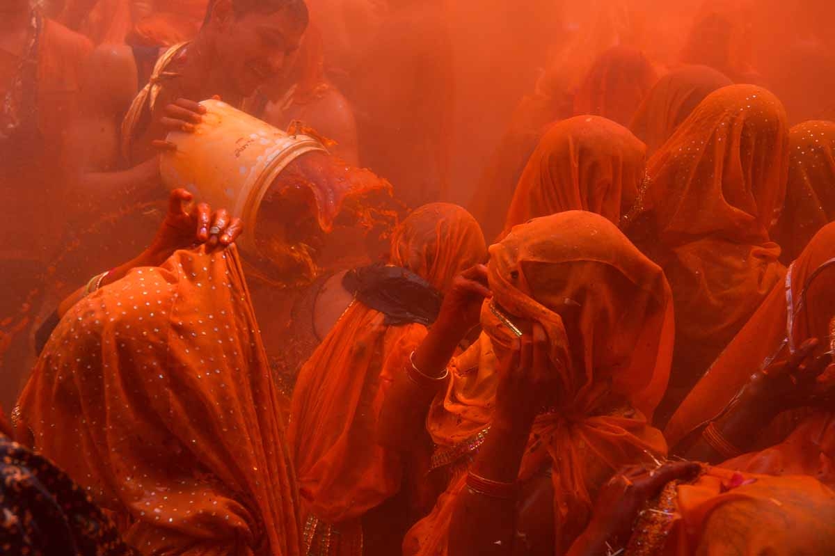Indian revellers take part in the game of 'Huranga' at The Dauji Temple in Mathura, some 100 kms south of New Delhi on March 14, 2017.