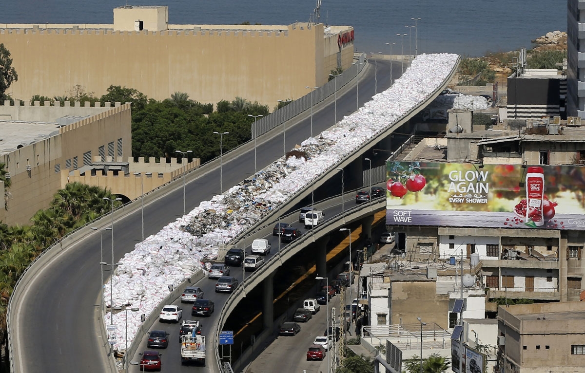 A general view shows rubbish bags piled up on the side of the road in the Jdeideh neighbourhood, north of Beirut, on September 20, 2016