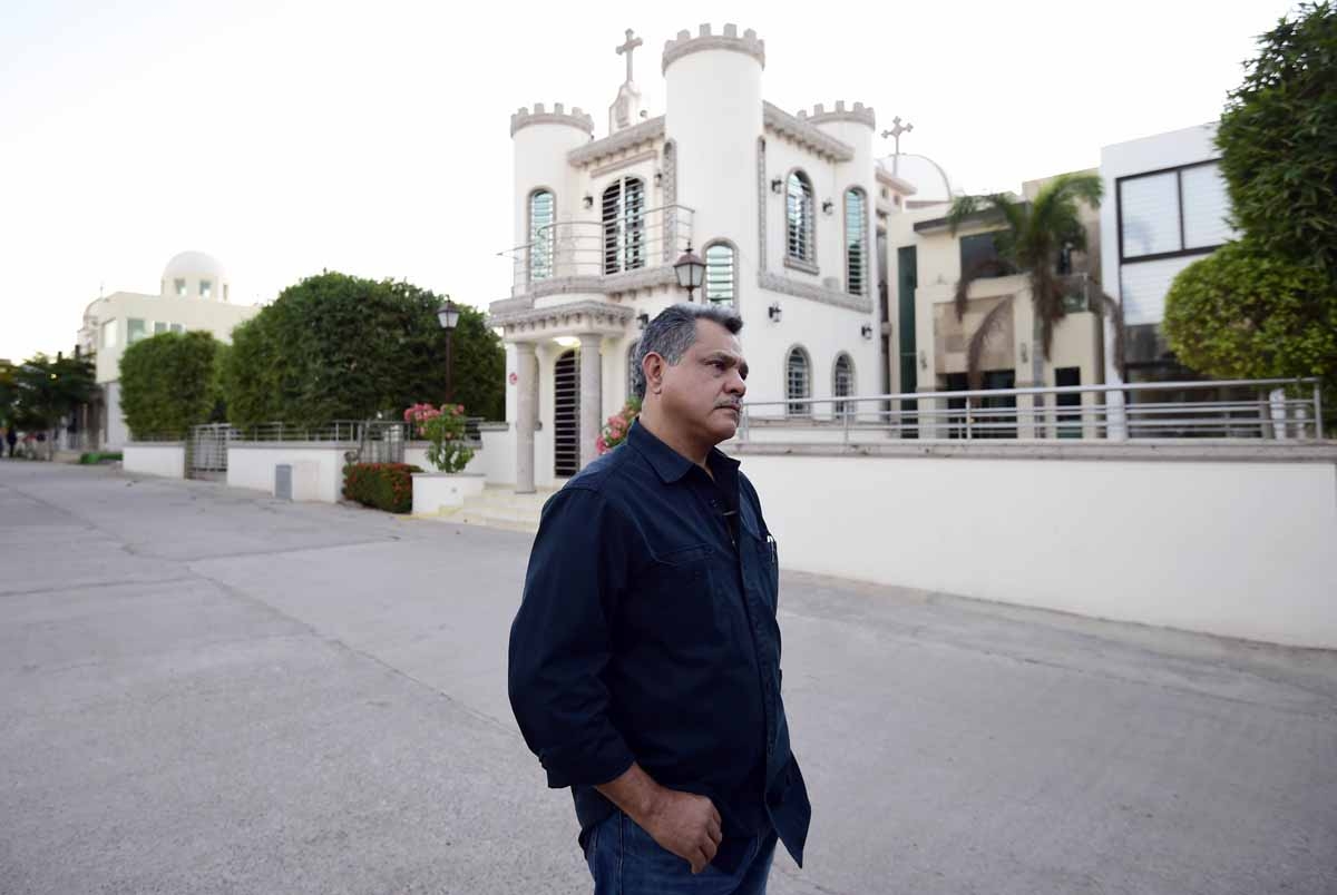 Juan Carlos Ayala, a philosophy professor from the Autonomous University of Sinaloa, during an interview with AFP at the Jardines del Humaya cemetery in Culiacan, Sinaloa state in northwest Mexico, on December 7, 2016.