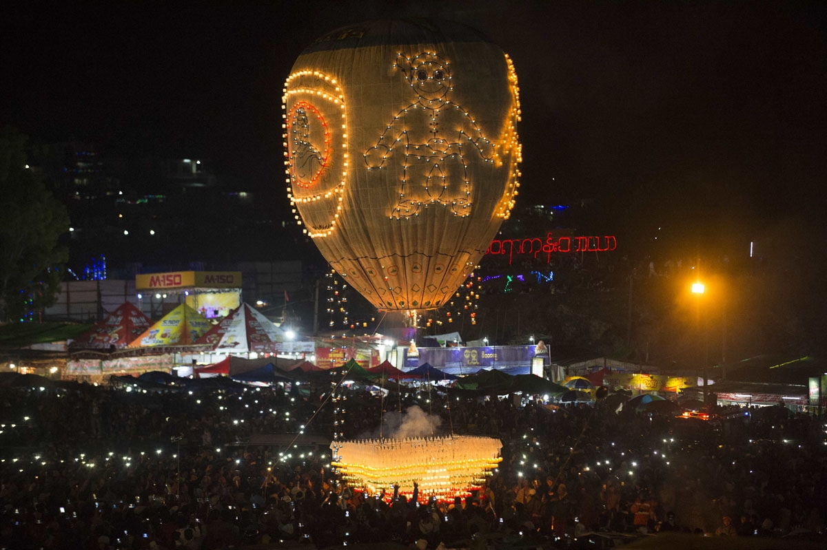 This picture taken on November 11, 2016 shows participants releasing a hot-air balloon during the Tazaungdaing Lighting Festival at Taunggyi in Myanmar's northeastern Shan State.