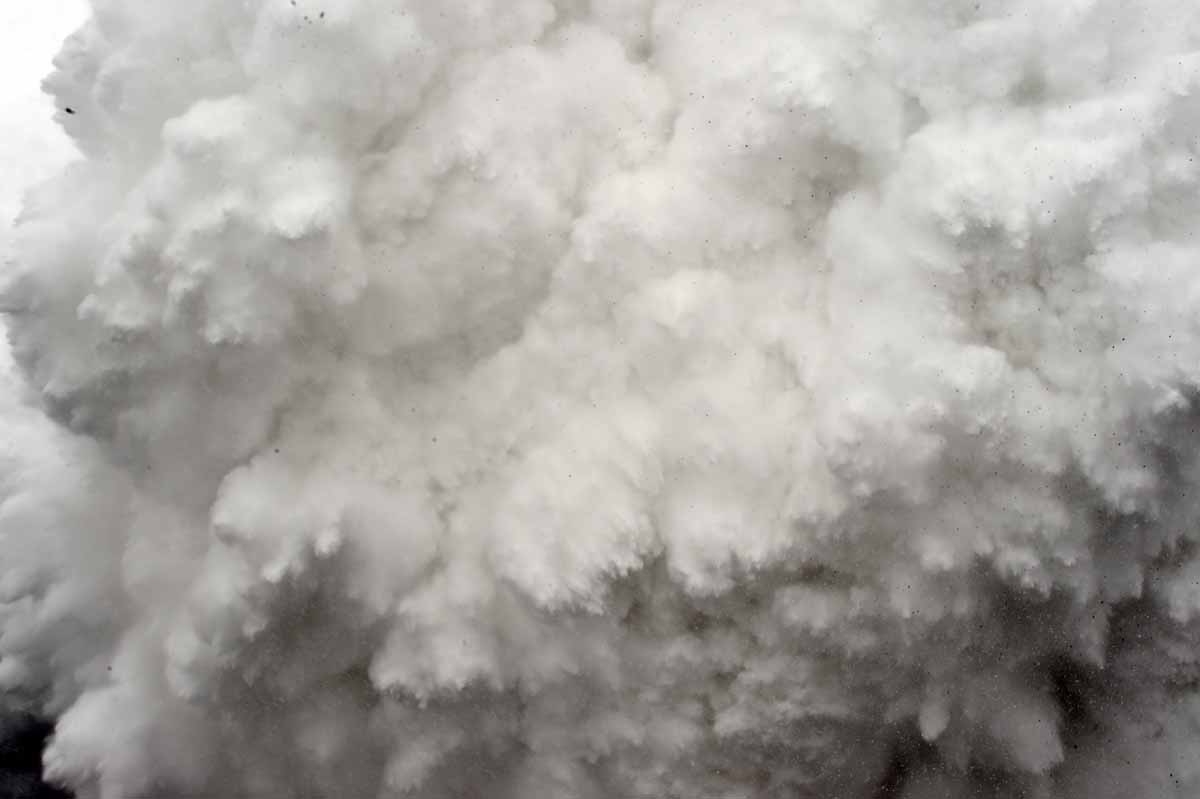 In this photograph taken on April 25, 2015, a cloud of snow and debris triggered by an earthquake flies towards Everest Base Camp, moments ahead of flattening part of the camp in the Himalayas. In this photograph taken on April 25, 2015, a cloud of snow and debris triggered by an earthquake flies towards Everest Base Camp, moments ahead of flattening part of the camp in the Himalayas.