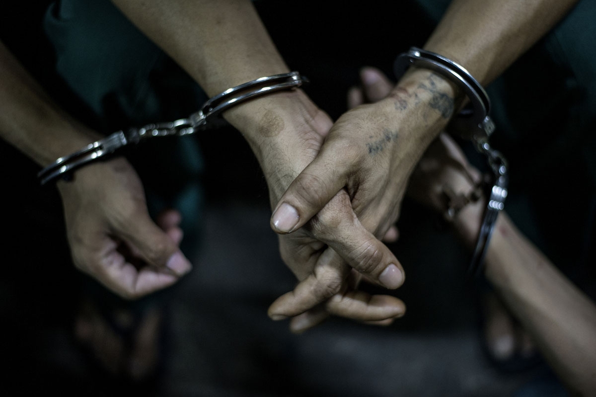 Inmates at the Quezon City Jail in Manila wait to be brought to court on July 29, 2016
