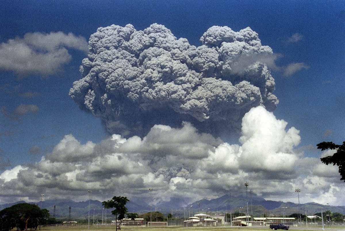 This picture taken 12 June 1991 shows a giant mushroom cloud of steam and ash exploding out of Mount Pinatubo volcano during its eruption as seen from inside the then US military Clark Air Base in Angeles, located in Pampanga province. This picture taken 12 June 1991 shows a giant mushroom cloud of steam and ash exploding out of Mount Pinatubo volcano during its eruption as seen from inside the then US military Clark Air Base in Angeles, located in Pampanga province.