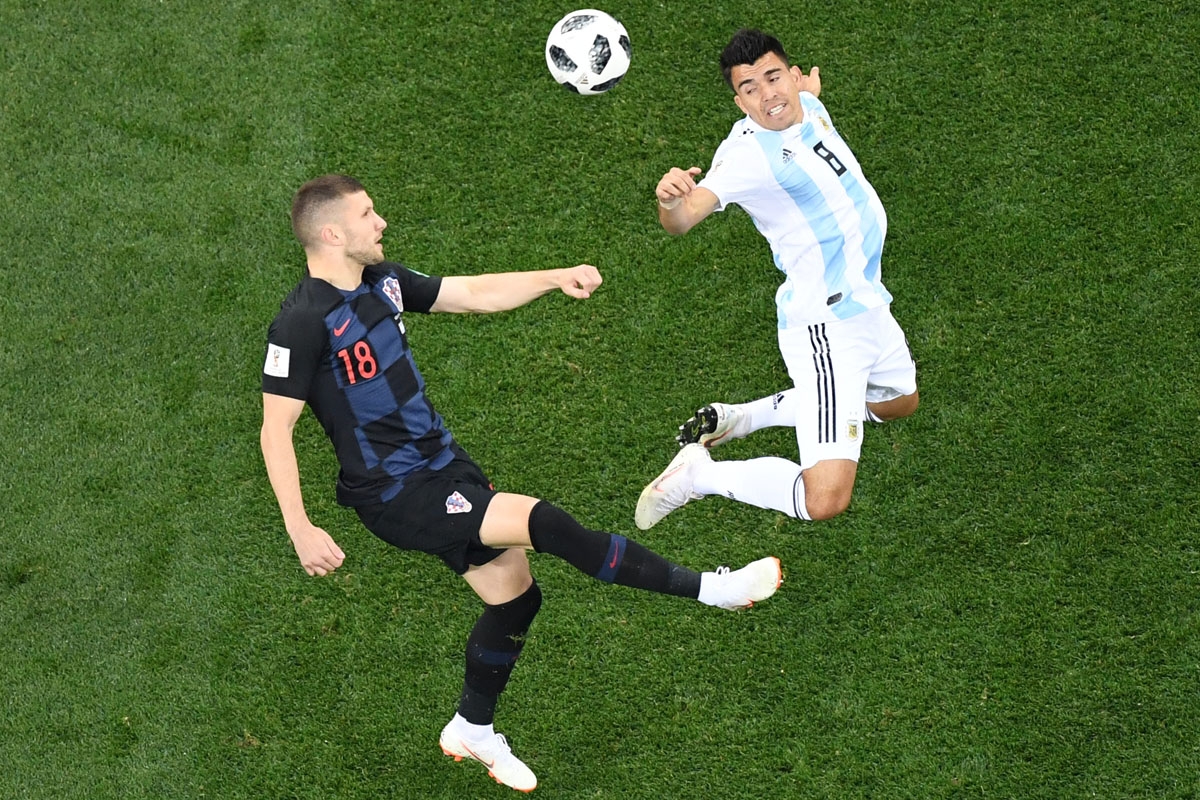 Croatia's forward Ante Rebic (L) vies Argentina's defender Marcos Acuna during the Russia 2018 World Cup Group D football match between Argentina and Croatia at the Nizhny Novgorod Stadium in Nizhny Novgorod on June 21, 2018.