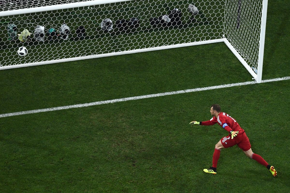 Germany's goalkeeper Manuel Neuer reacts after conceding during the Russia 2018 World Cup Group F football match between Germany and Sweden at the Fisht Stadium in Sochi on June 23, 2018. / AFP