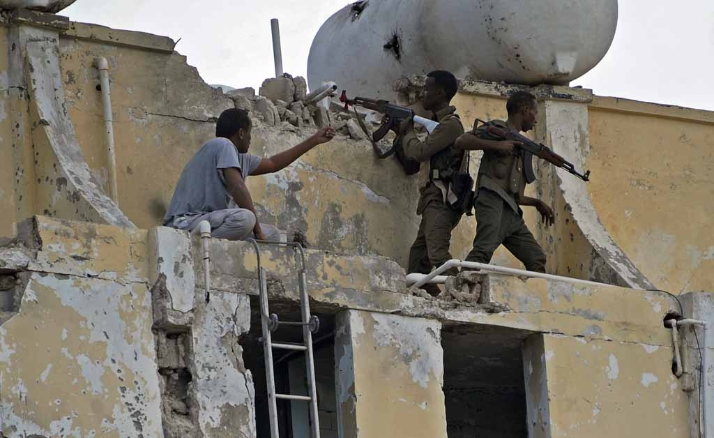 Somalian security forces clear the upper floor of the Ambassador Hotel, which was the scene of a terror attack, in Mogadishu on June 2, 2016. Somalian security forces clear the upper floor of the Ambassador Hotel, which was the scene of a terror attack, in Mogadishu on June 2, 2016.