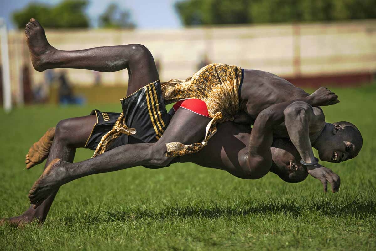 Two participants from Imatong and Terekeka counties take part of the South Sudan National Wrestling Competition for peace at Juba Stadium, on April 20, 2016.
