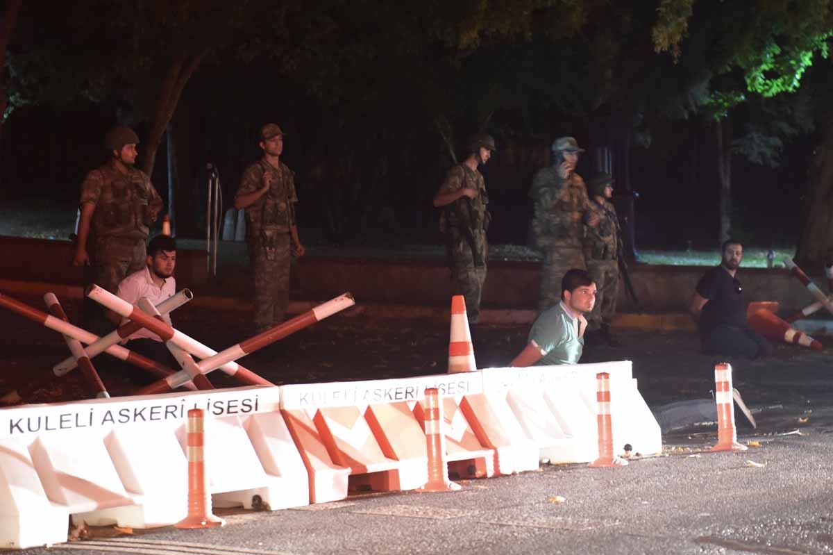 Turkish security officers detain unknown individuals on the side of the road on July 15, 2016 in Istanbul, during a security shutdown of the Bosphorus Bridge. Turkish security officers detain unknown individuals on the side of the road on July 15, 2016 in Istanbul, during a security shutdown of the Bosphorus Bridge.