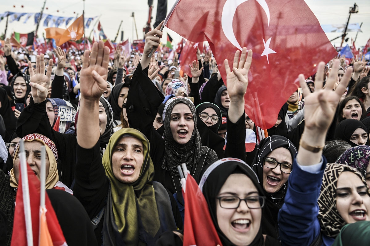 Erdogan's supporters listen to him speak in Yenikapi Square in Istanbul, June 17, 2018.