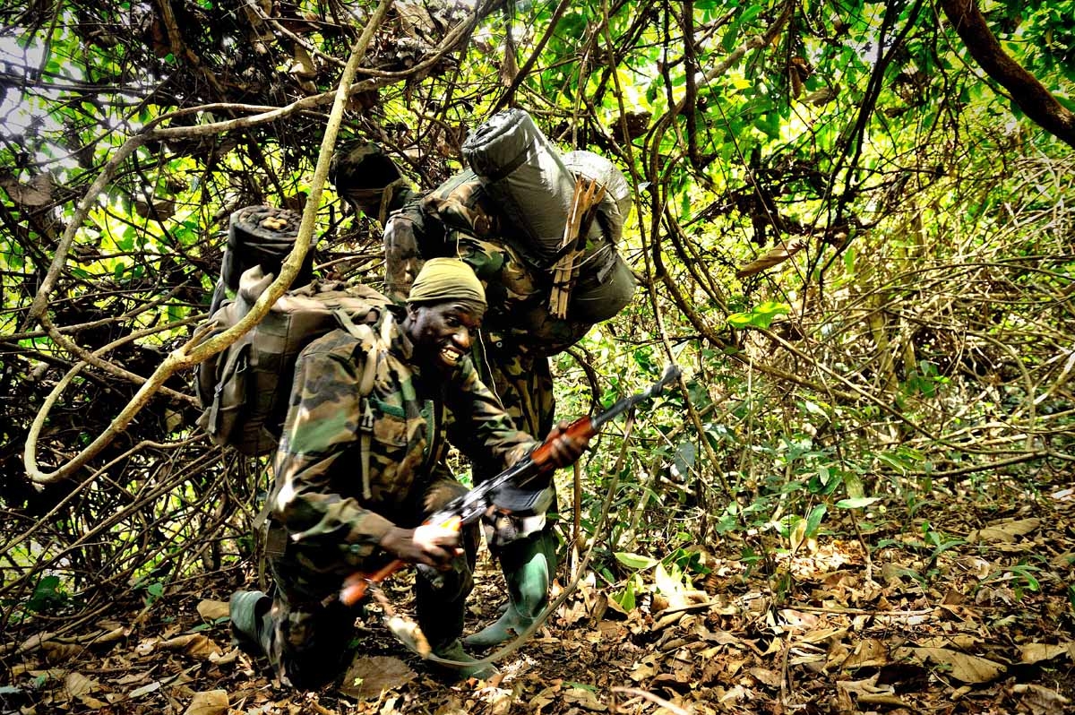 Ugandan soldiers patrol on April 19, 2012 through the central African jungle during an operation to fish out notorious Lord's Resistance Army (LRA) leader Joseph Kony.