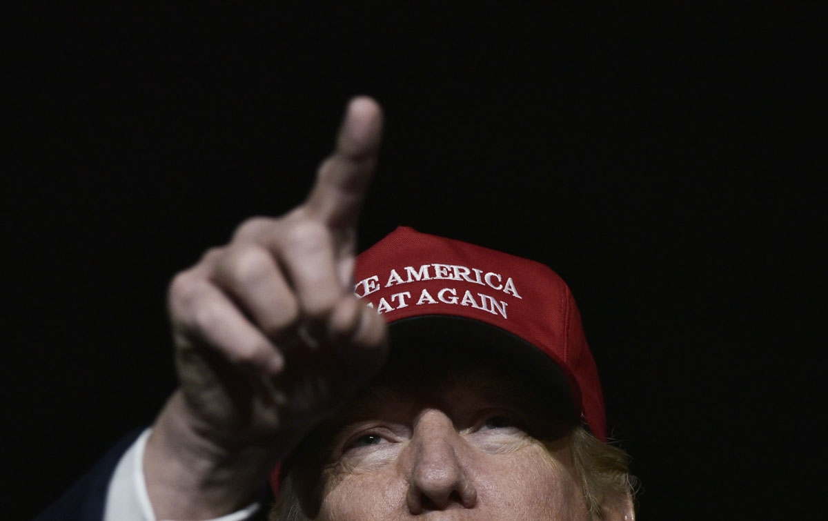 US Republican presidential nominee Donald Trump addresses a campaign rally at Atlantic Aviation in Moon Township, Pennsylvania on November 6, 2016.