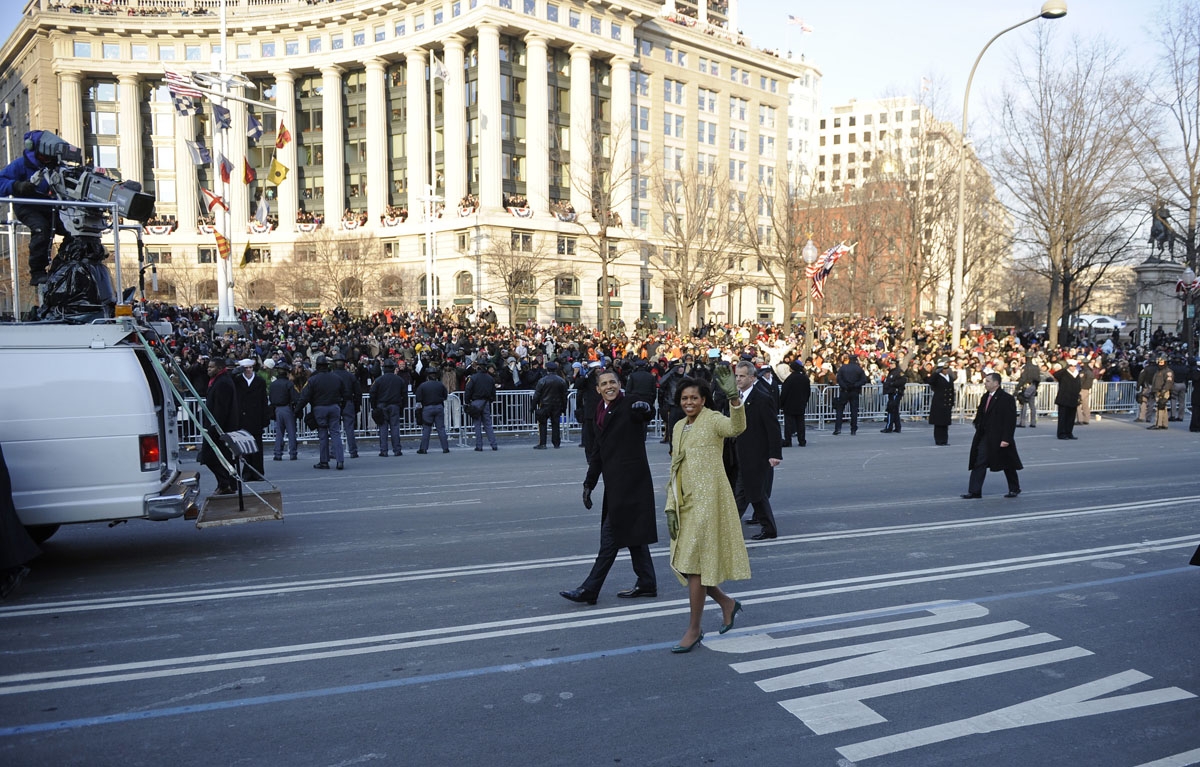 US President Barack Obama and First Lady Michelle walk the Inaugural Parade route after Obama was sworn in as 44th US president January 20, 2009 in Washington, DC.