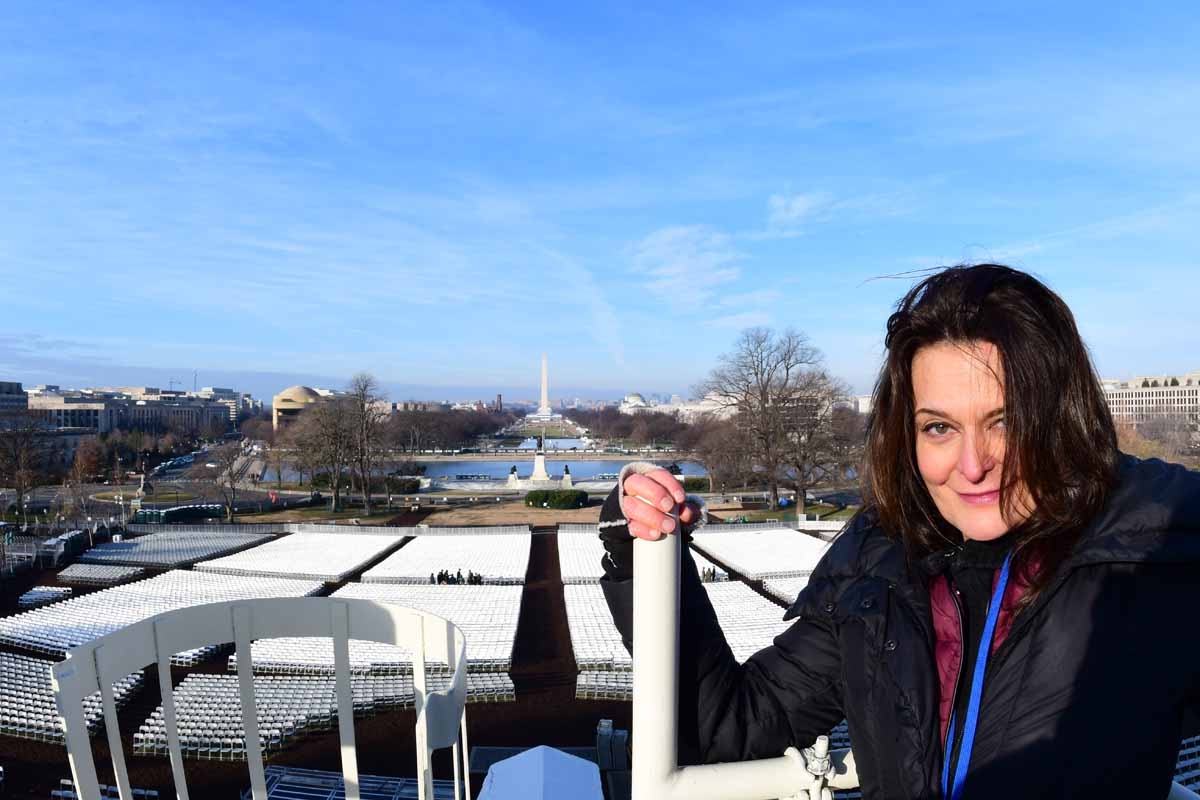 Eva Hambach poses atop the center stand camera position ahead of an inaugural dress rehearsal on the West side of the US Capitol on January 15, 2017 in Washington, DC five days ahead of the inauguration of US President-elect Donald Trump.