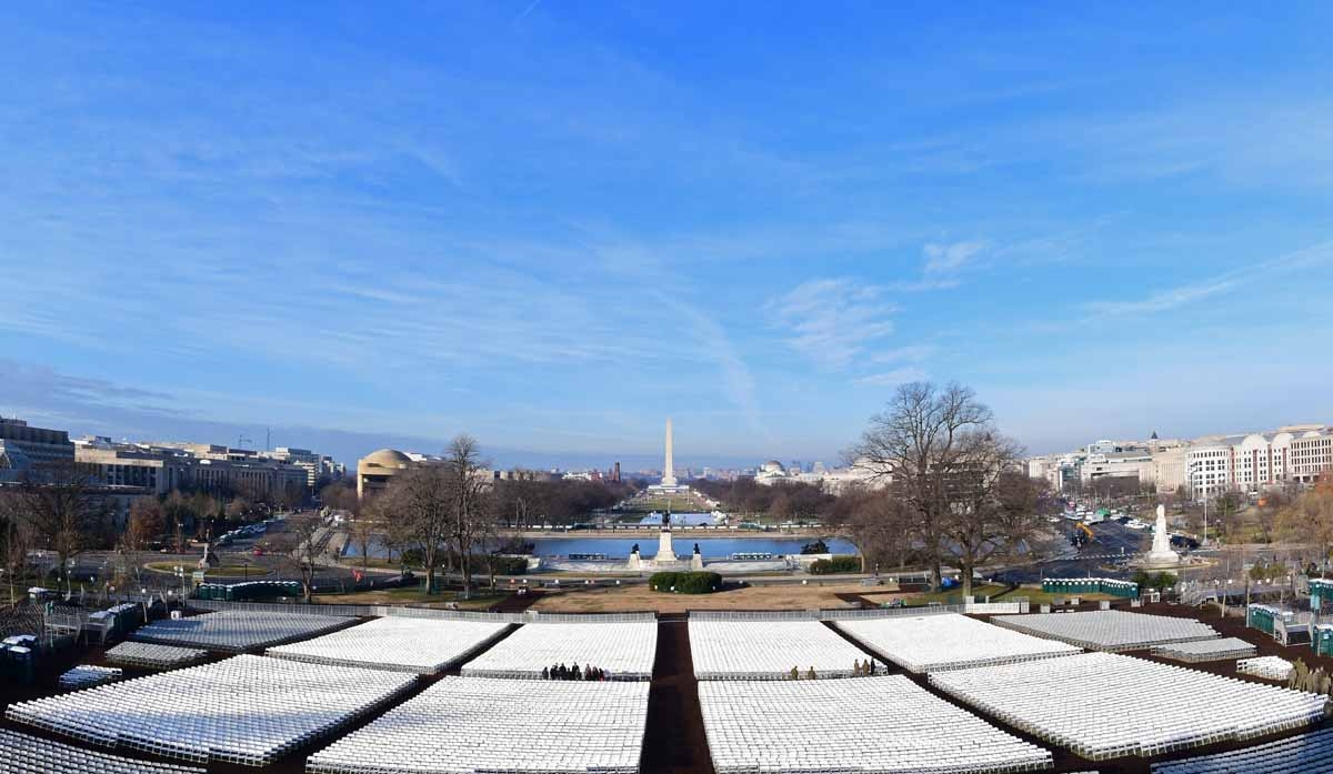 Rows of chairs stretch across the lawn on the West side of the US Capitol with a view of the National Mall and the Washinghton Monument early on January 15, 2017 in Washington, DC five days ahead of the inauguration of US President-elect Donald Trump.
