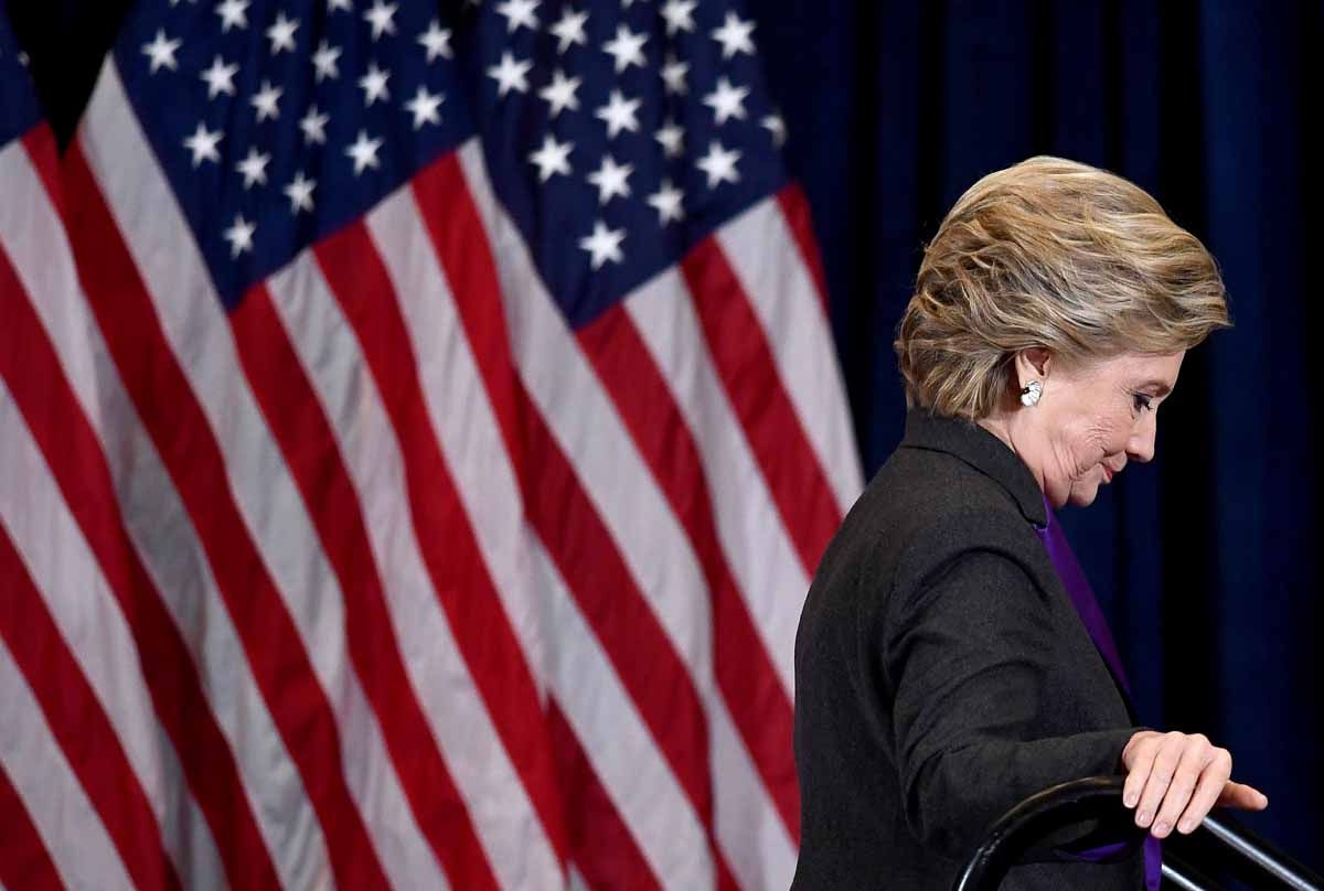 US Democratic presidential candidate Hillary Clinton steps down a staircase after making a concession speech following her defeat to Republican President-elect Donald Trump, in New York on November 9, 2016. US Democratic presidential candidate Hillary Clinton steps down a staircase after making a concession speech following her defeat to Republican President-elect Donald Trump, in New York on November 9, 2016.