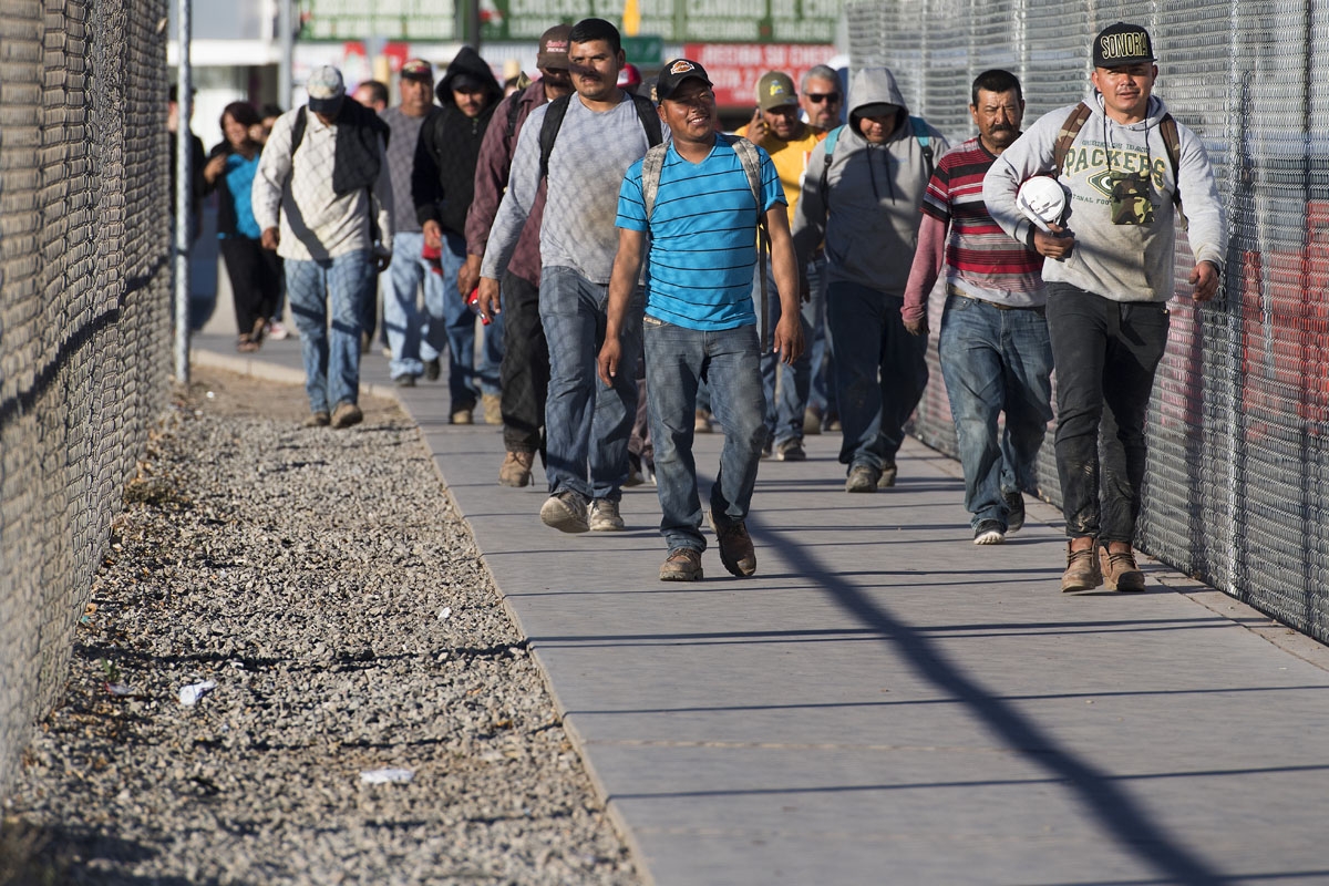 Temporary agricultural workers return to the Port of Entry in San Luis, Arizona, on February 15, 2017.