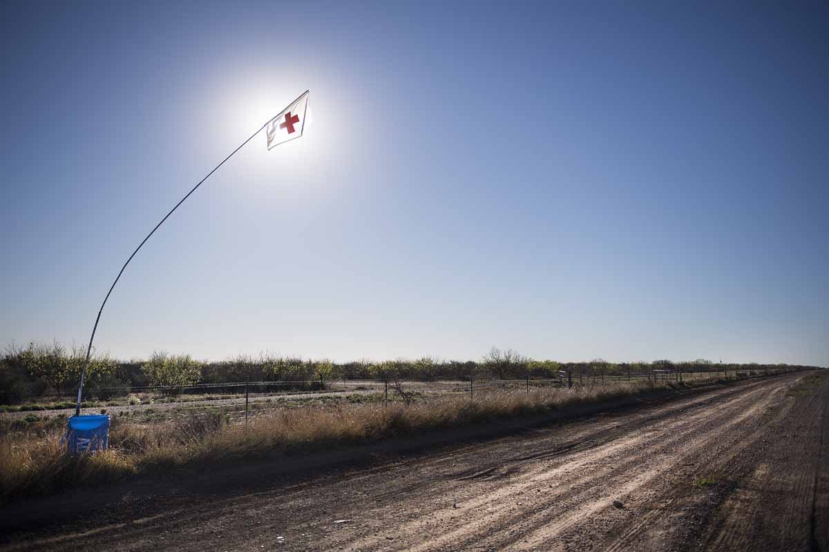 A barrel with water stands on a dirt road near the US/Mexico border outside Eagle Pass, Texas, on February 22, 2017.