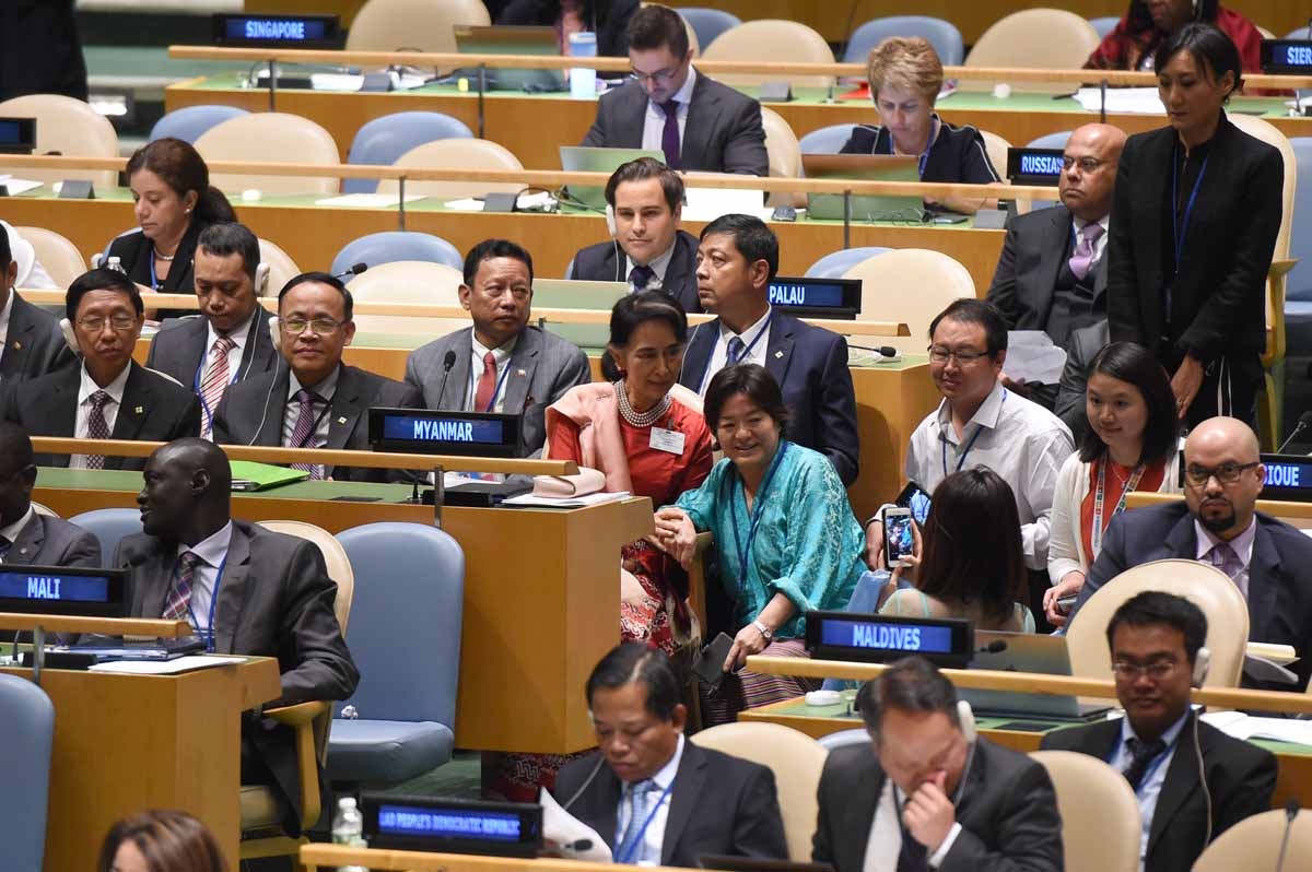 Aung San Suu Kyi, State Counsellor and Minister for Foreign Affairs of Myanmar, has photos taken with other delegates prior to giving her address at the United Nations General Assembly General Debate September 21, 2016 at the UN in New York. Aung San Suu Kyi, State Counsellor and Minister for Foreign Affairs of Myanmar, has photos taken with other delegates prior to giving her address at the United Nations General Assembly General Debate September 21, 2016 at the UN in New York.