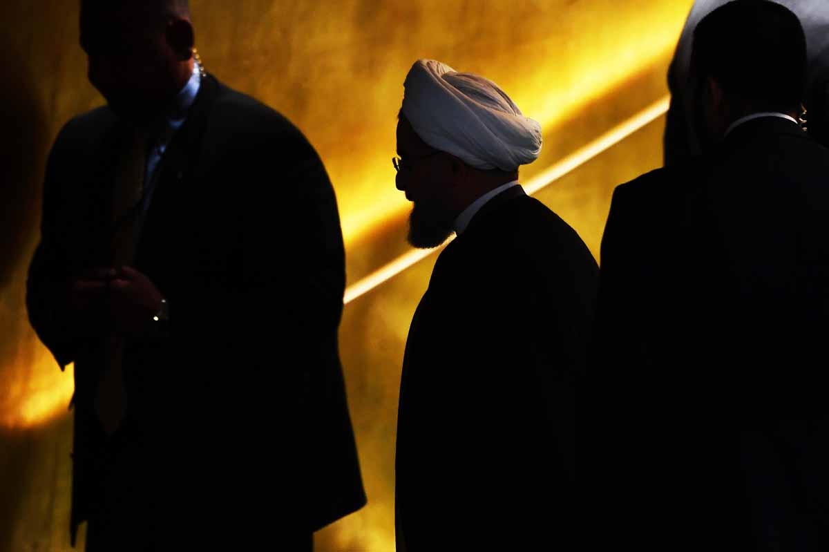 Iran's President Hassan Rouhani (C) leaves after addressing the 71st session of the United Nations General Assembly at the UN headquarters in New York on September 22, 2016. 