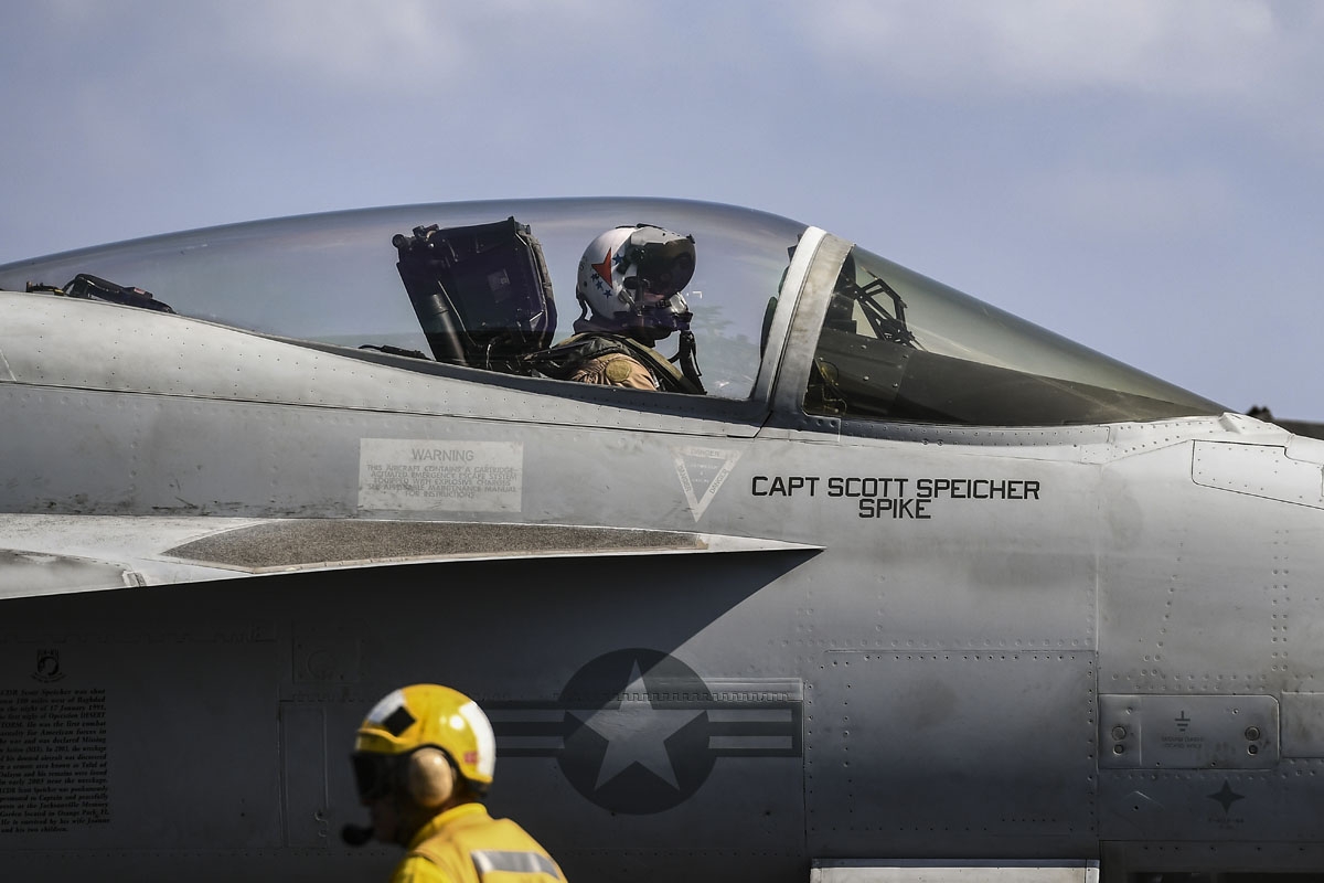 An F18 Hornet fighter jet pilot waits to take off from the 330 meters aircraft carrier USS Harry S. Truman in the eastern Mediterranean Sea on May 8, 2018.