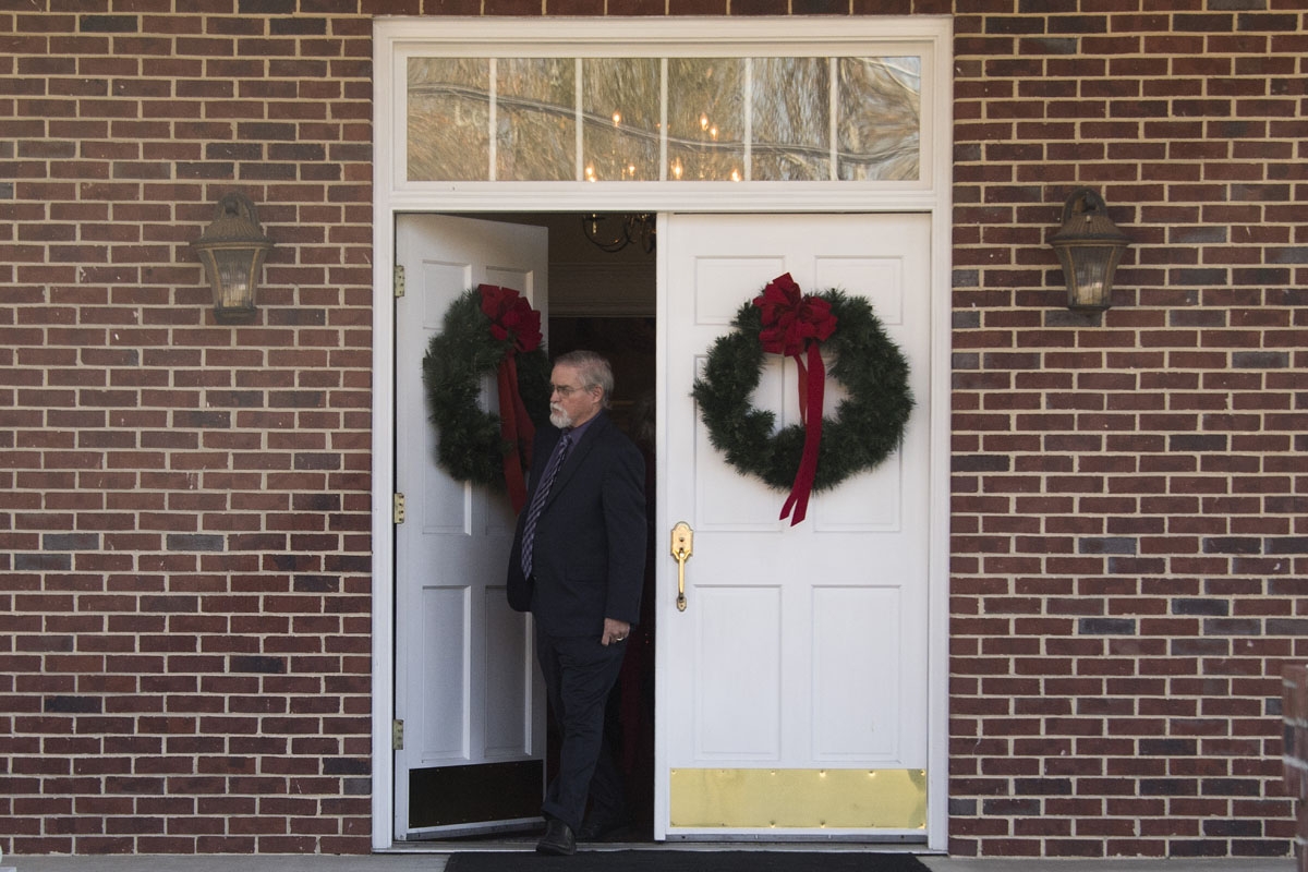 First Baptist Church of Gallant Pastor Tom Brown, a supporter of Republican Senatorial candidate Roy Moore, edits his church to speak to the press after Sunday Service in Gallant, AL, on December 10, 2017.